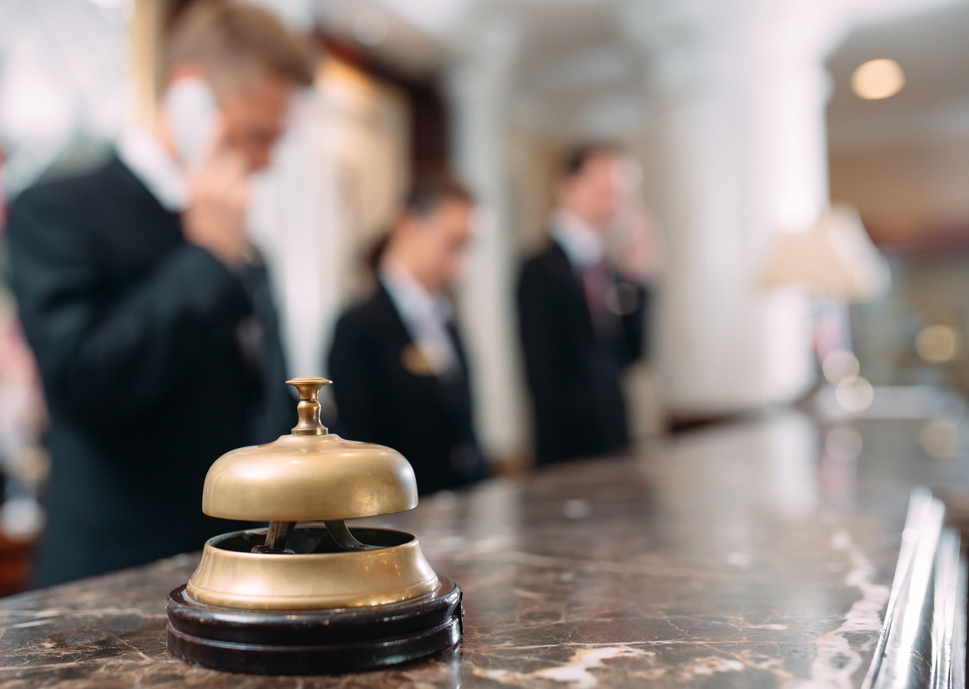 Hotel service bell Concept hotel, travel, room,Modern luxury hotel reception counter desk on background.